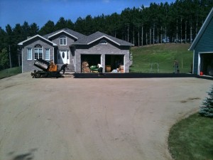 prepared base with equipment prior to paving